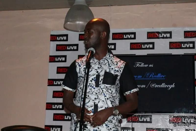 Taking the mic between sets · Accra